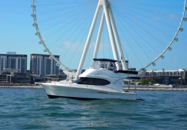48 FT Riviera Yacht Rental Dubai cruising in Dubai Marina