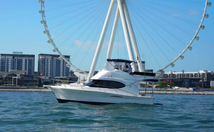 48 FT Riviera Yacht Rental Dubai cruising in Dubai Marina