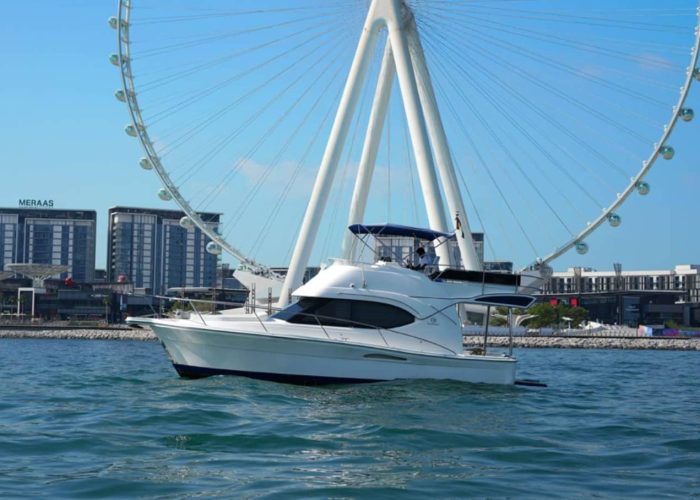 48 FT Riviera Yacht Rental Dubai cruising in Dubai Marina