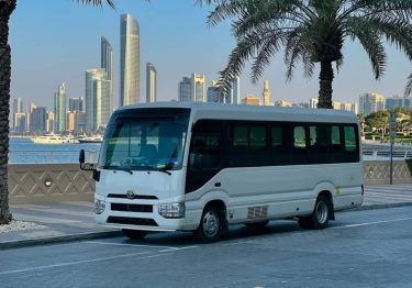 Toyota Coaster 20 Seater Bus Dubai modern coach side profile