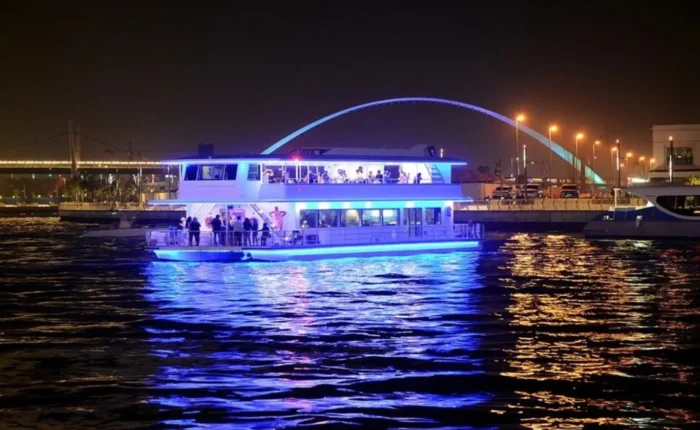 Dubai Marina Catamaran Cruise sailing through Dubai Marina waterfront