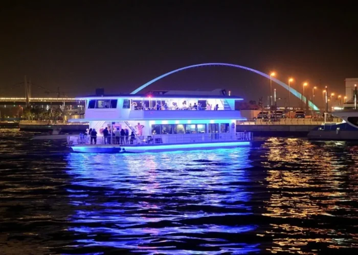 Dubai Marina Catamaran Cruise sailing through Dubai Marina waterfront